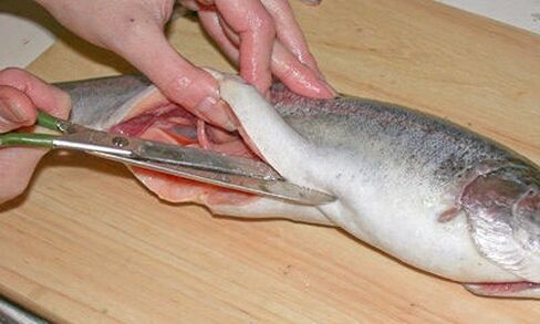 Carefully cut fish on a personal cutting board to protect against parasites