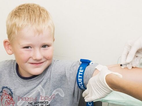 Children donate blood for analysis in case of suspected parasitic infection. 