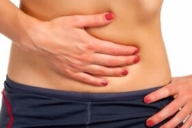 Abdominal pain due to the presence of parasites in the body